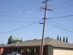 solar panel hardware on the roof of a business