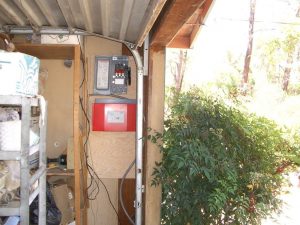 an electric box inside a garage