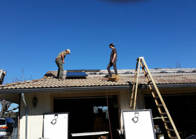 solar panel hardware being installed on a roof