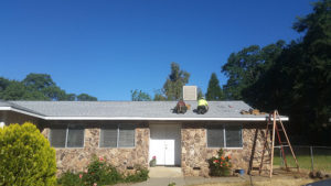 solar panel hardware being installed on a roof