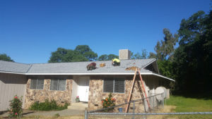 solar panel hardware being installed on a roof