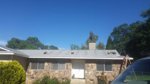 solar panel hardware being installed on a roof