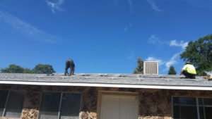 solar panel hardware being installed on a roof