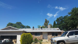 solar panel hardware being installed on a roof