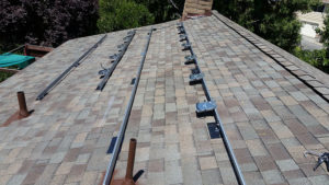 hardware installed on a roof, ready for solar panels