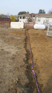 a red line in a trench that was just dug