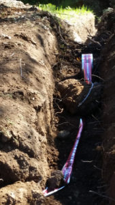 a trench with a red line in it