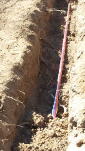 a trench with a red line in it