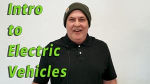 A photo of Dan that displays the title "Intro to electric vehicles"